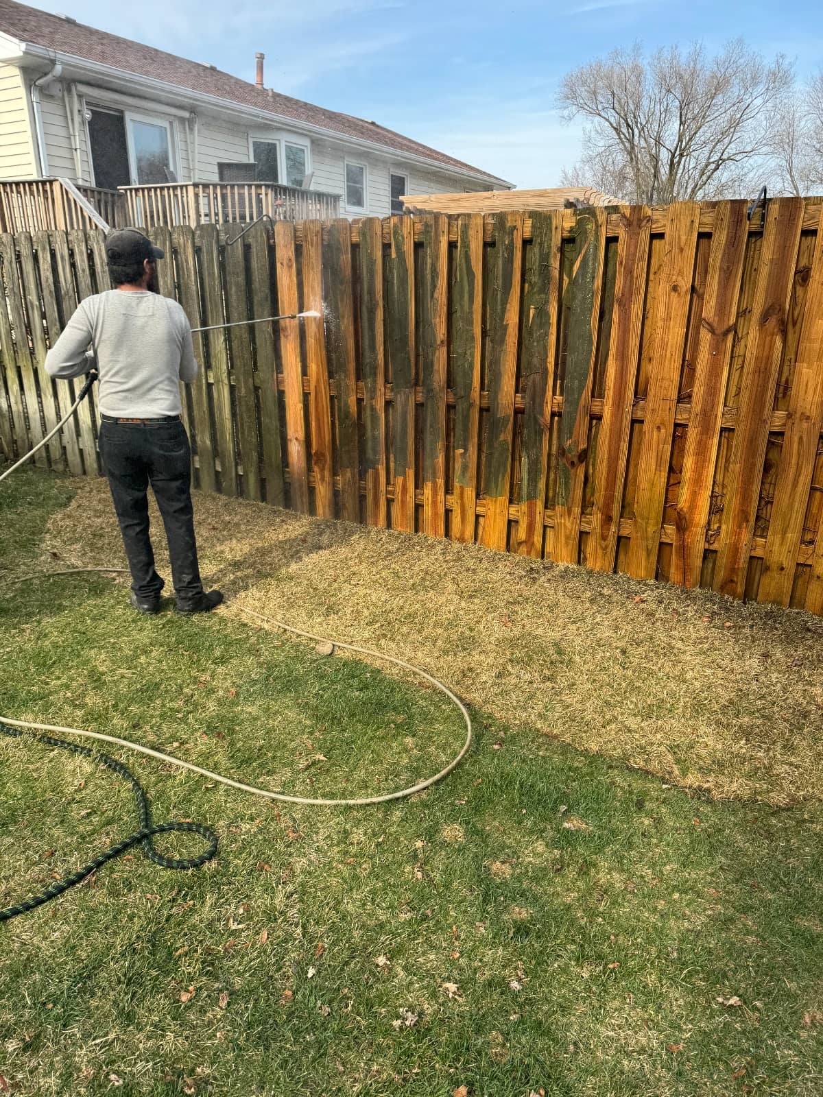 pressure washing the fence